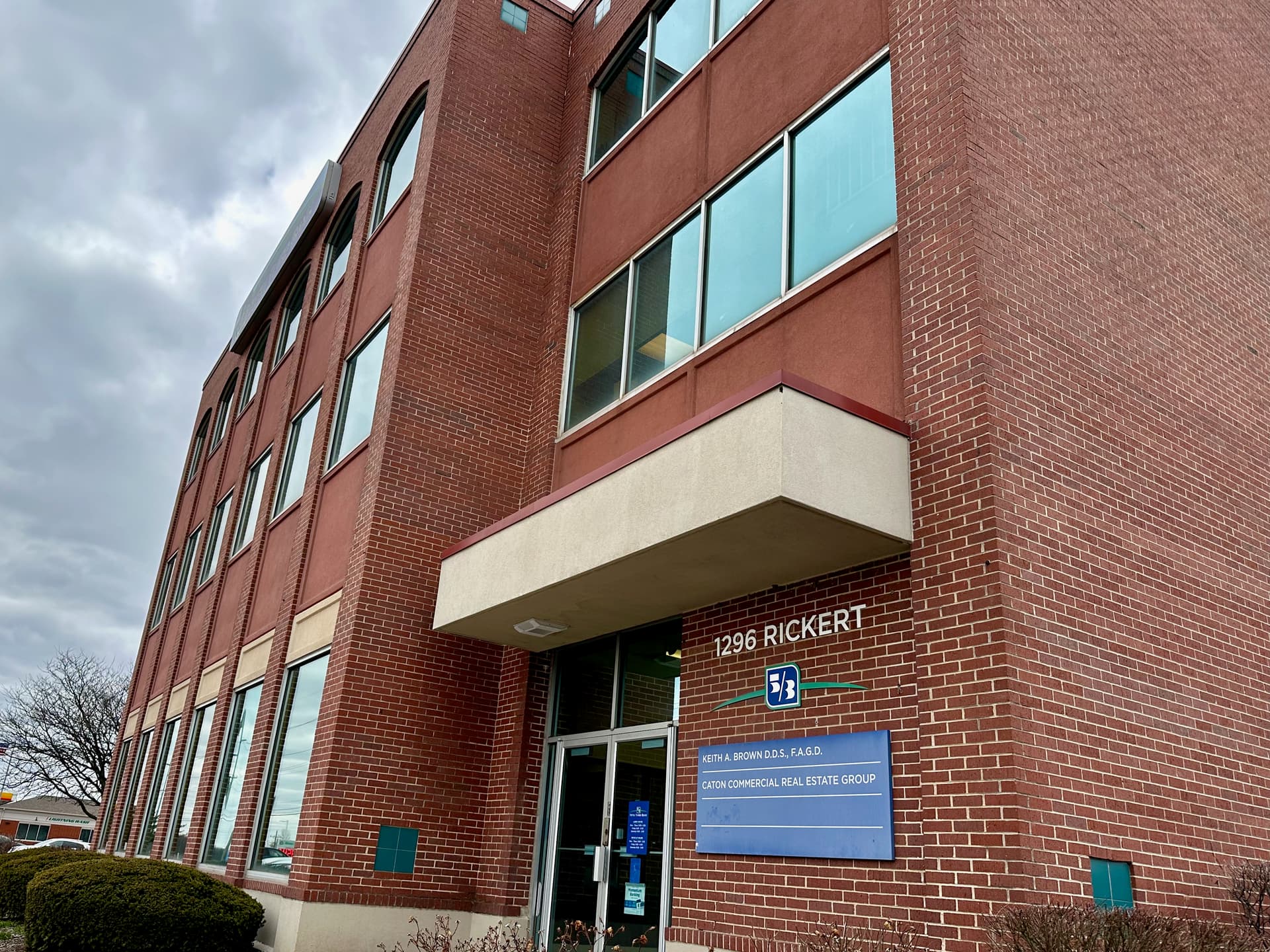 Close-up view of the Fifth Third Bank building at 1295 Rickert Drive, Naperville, IL, showing the entrance to Dr. Brown's dental office.